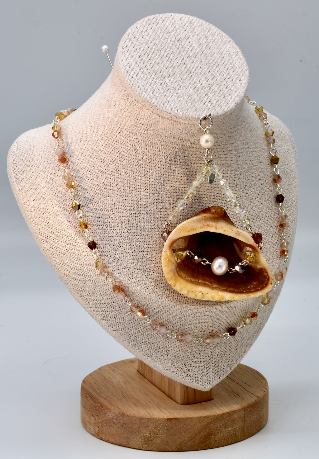 Brown and Tan Shell and Crystal Pendant and Necklace